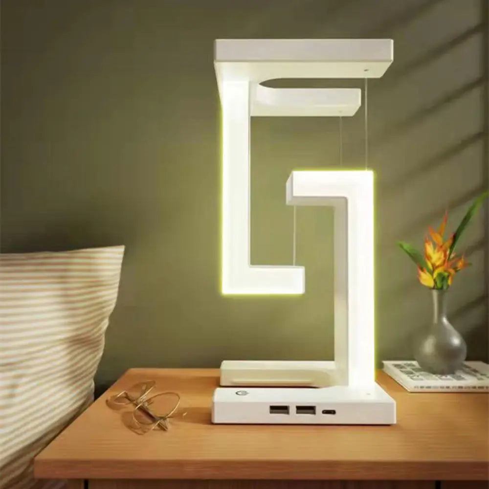 Modern LED desk lamp on a wooden surface with a neutral background