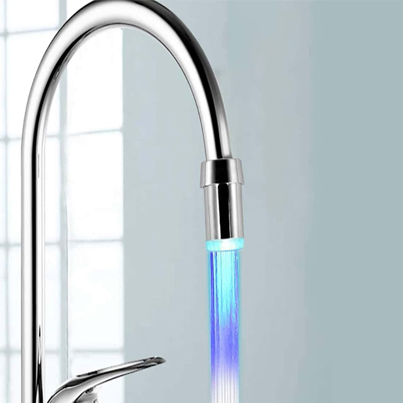 Chrome kitchen faucet with a LED light bar on a neutral background