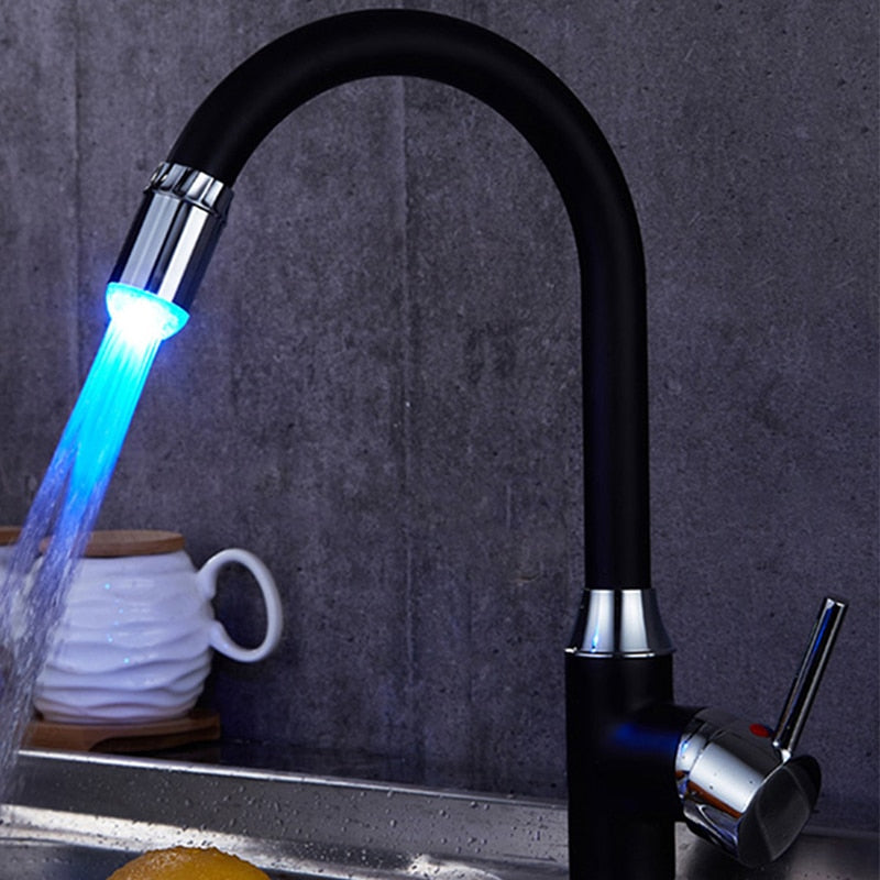 Black faucet with LED light on a dark gray background