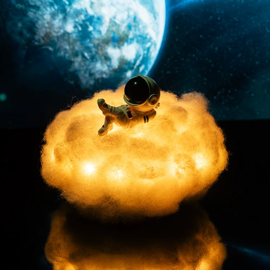 Small robot on a fluffy cloud with Earth in the background