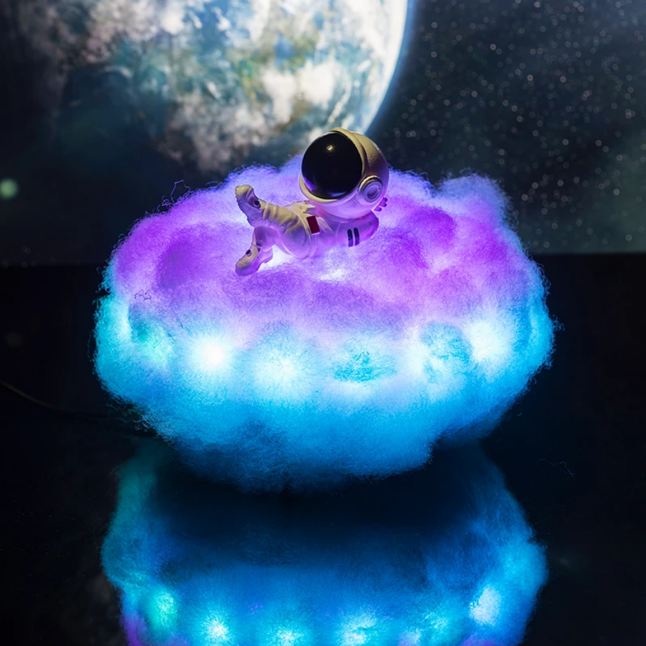 Toy astronaut on a glowing cloud with Earth in the background
