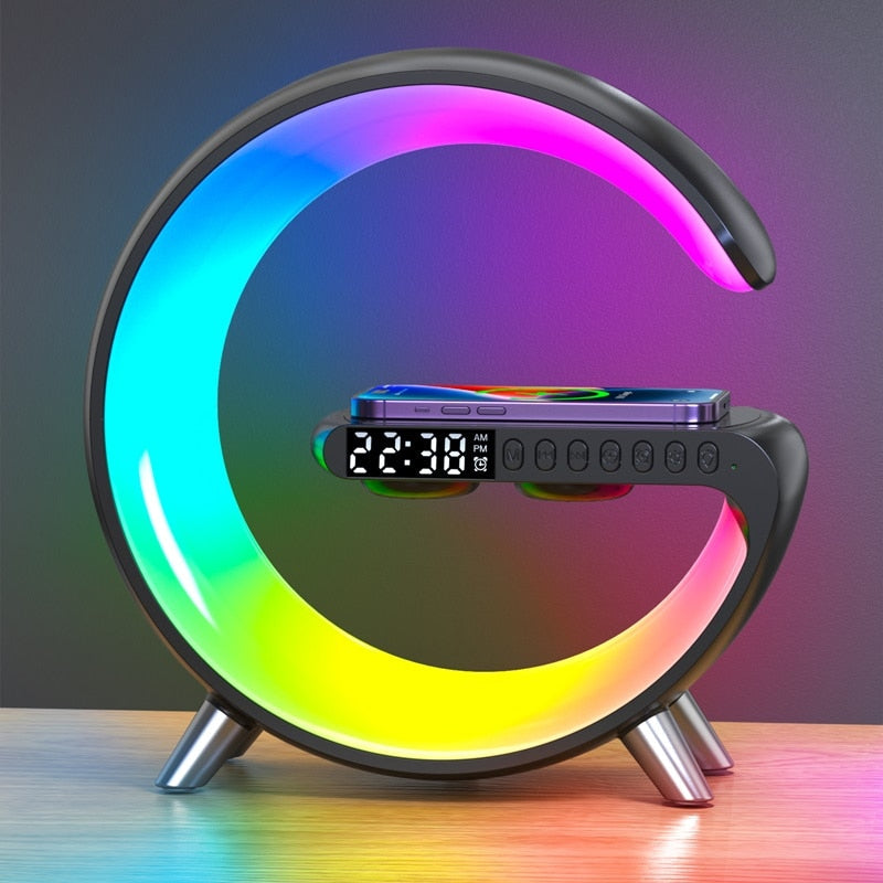 Colorful LED lamp with digital clock on a wooden surface