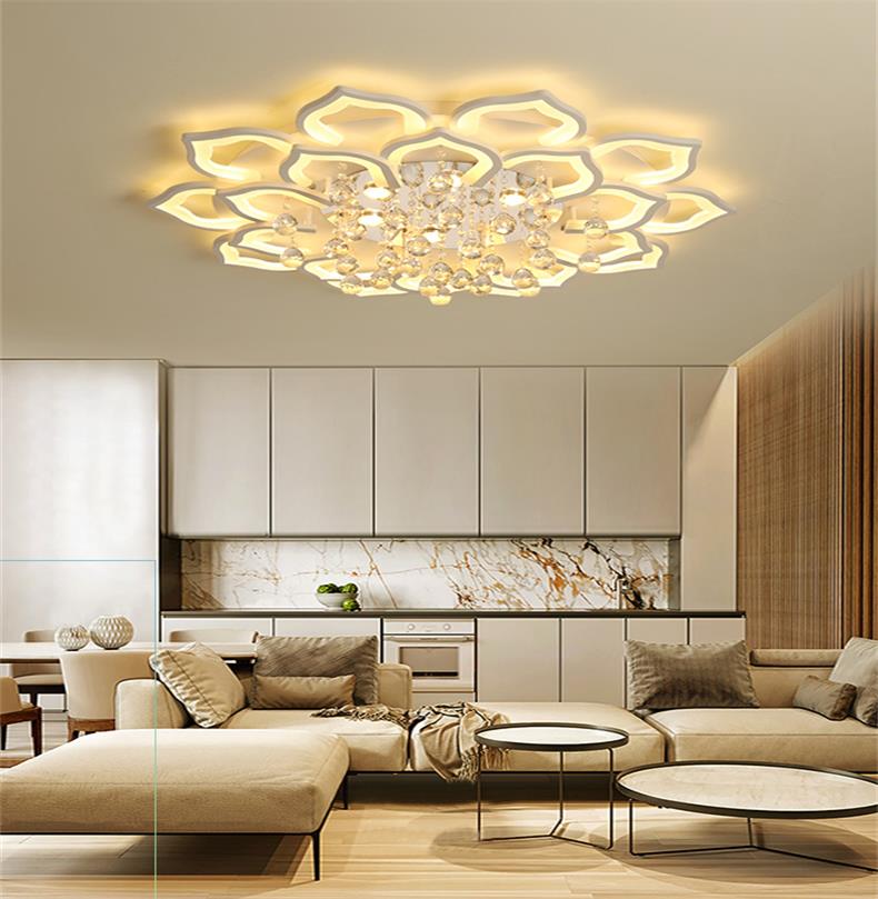 Modern living room with a decorative ceiling light fixture.