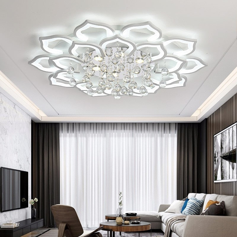 Modern living room with a decorative ceiling light fixture.