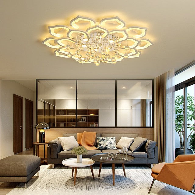 Modern living room with a decorative ceiling light fixture.