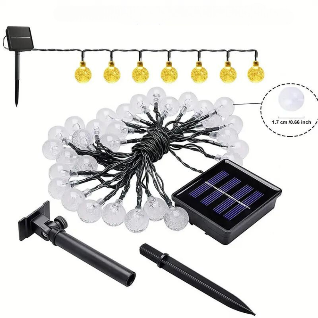 Solar string lights with solar panel and stakes on a white background
