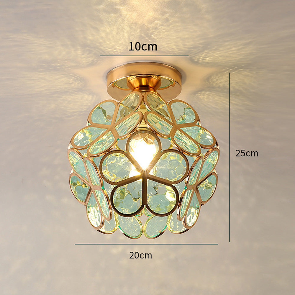 Ceiling light fixture with decorative glass shade and measurements on a neutral background