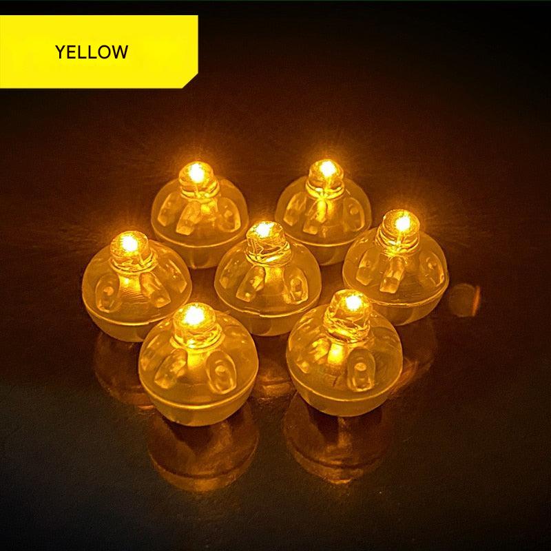 Yellow LED lights on a dark background