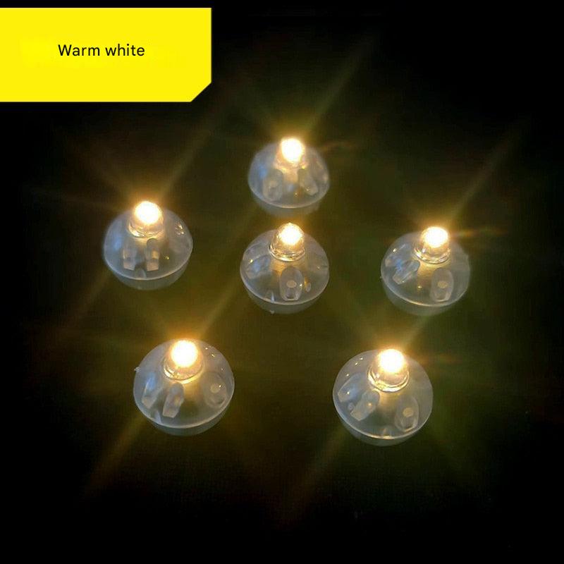 Warm white LED lights on a black background with 'Warm white' label.
