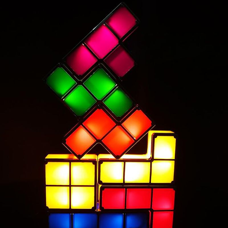 Colorful light-up block design on a black background