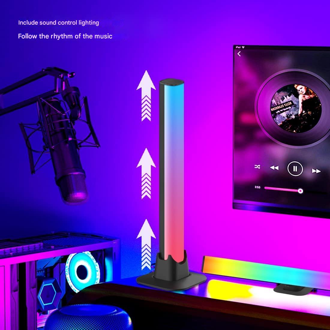 Colorful LED lamp with sound control feature in a music-themed room.