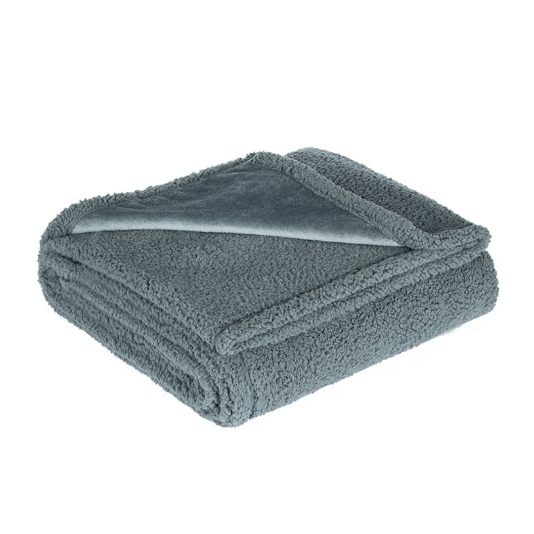 Folded gray blanket on a white background