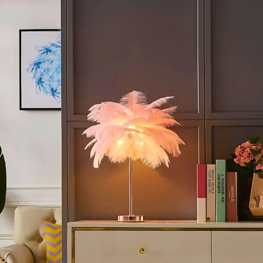 Feathered table lamp on a shelf with books and decor in a room setting
