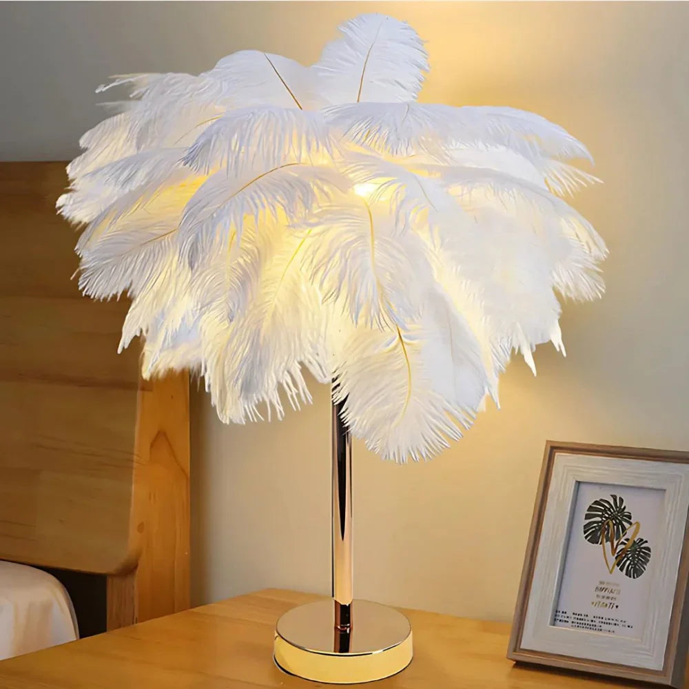 Feathered table lamp on a wooden surface with a blurred background