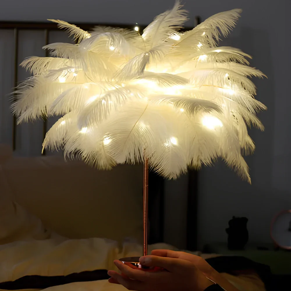 Feathered lamp with string lights held by a person in a bedroom setting