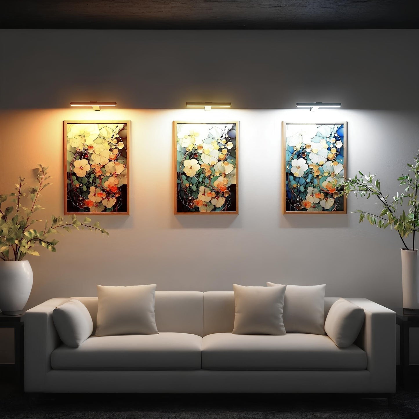 Modern living room with a white sofa, decorative pillows, and wall art.