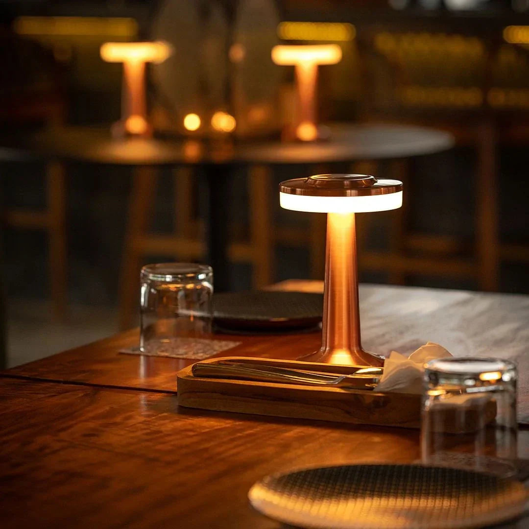 Small lamp on a wooden table with a blurred background