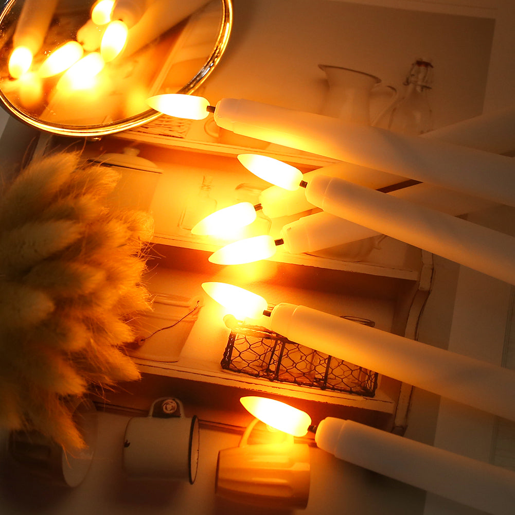 String lights draped over a surface with a warm glow