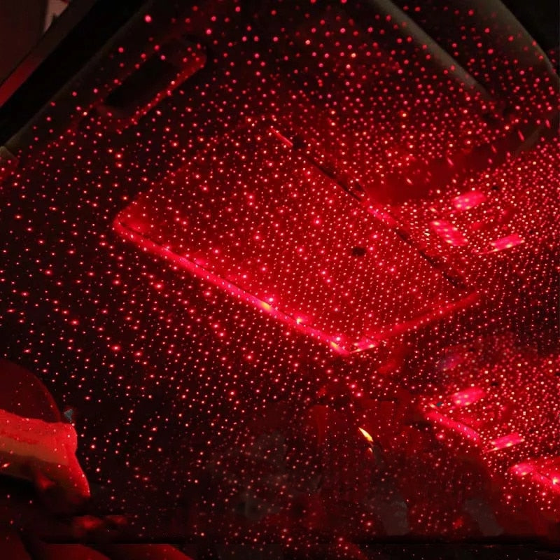 Car interior with red LED lights on the ceiling