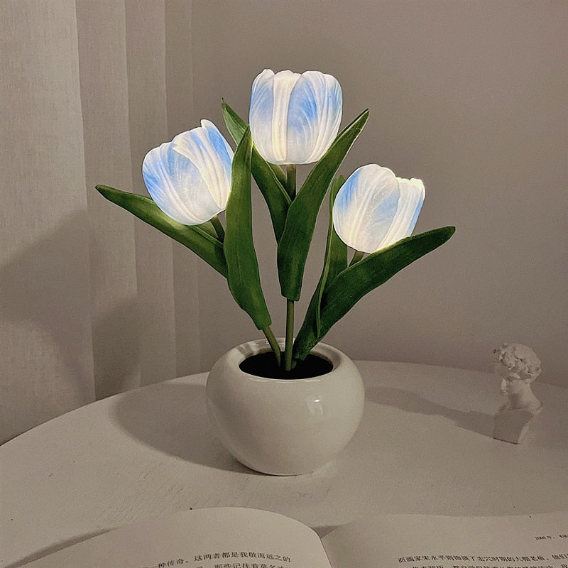 Potted plant with glowing white flowers on a neutral background