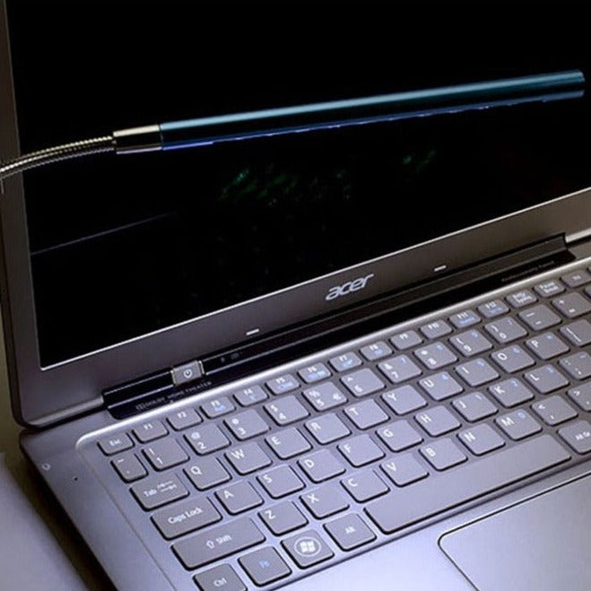 Open laptop with Acer logo and flexible LED light on screen