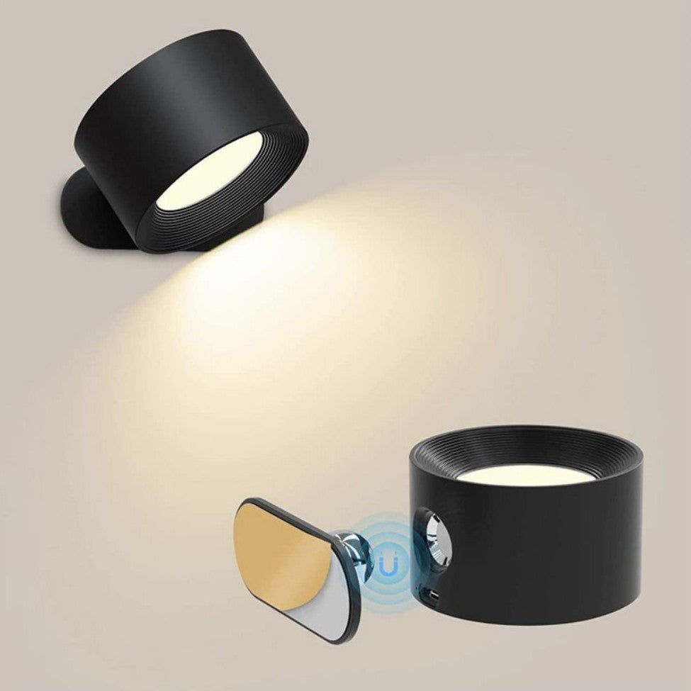 Black wall-mounted light fixture on a neutral background