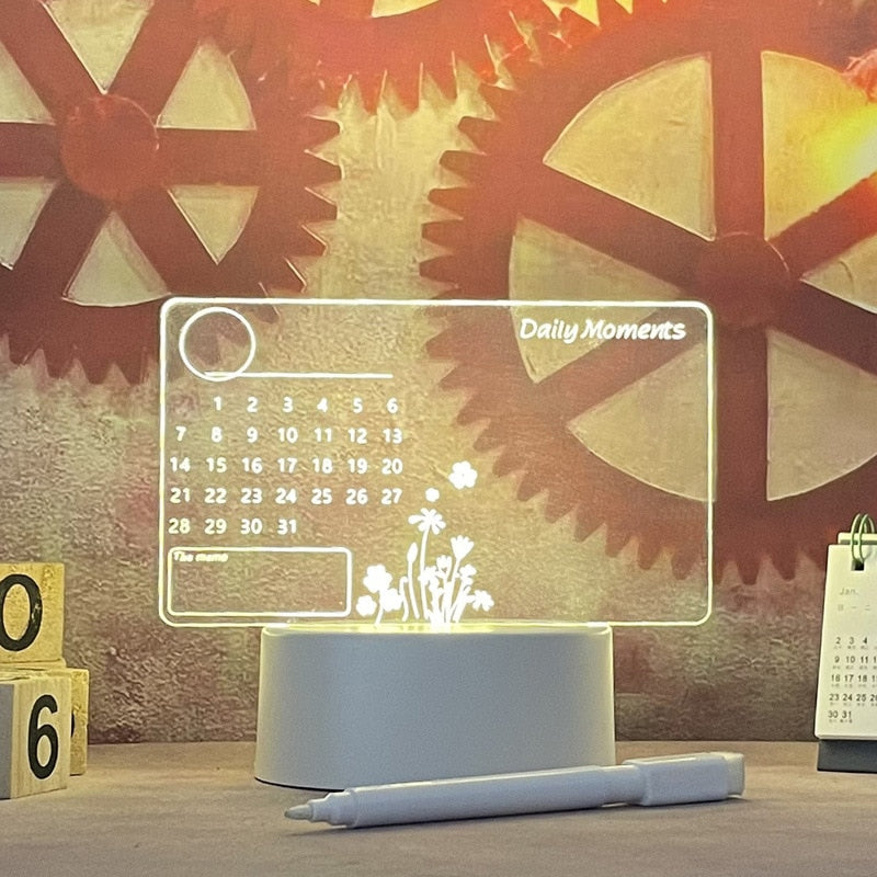 Calendar with gears in the background and a pen on a surface