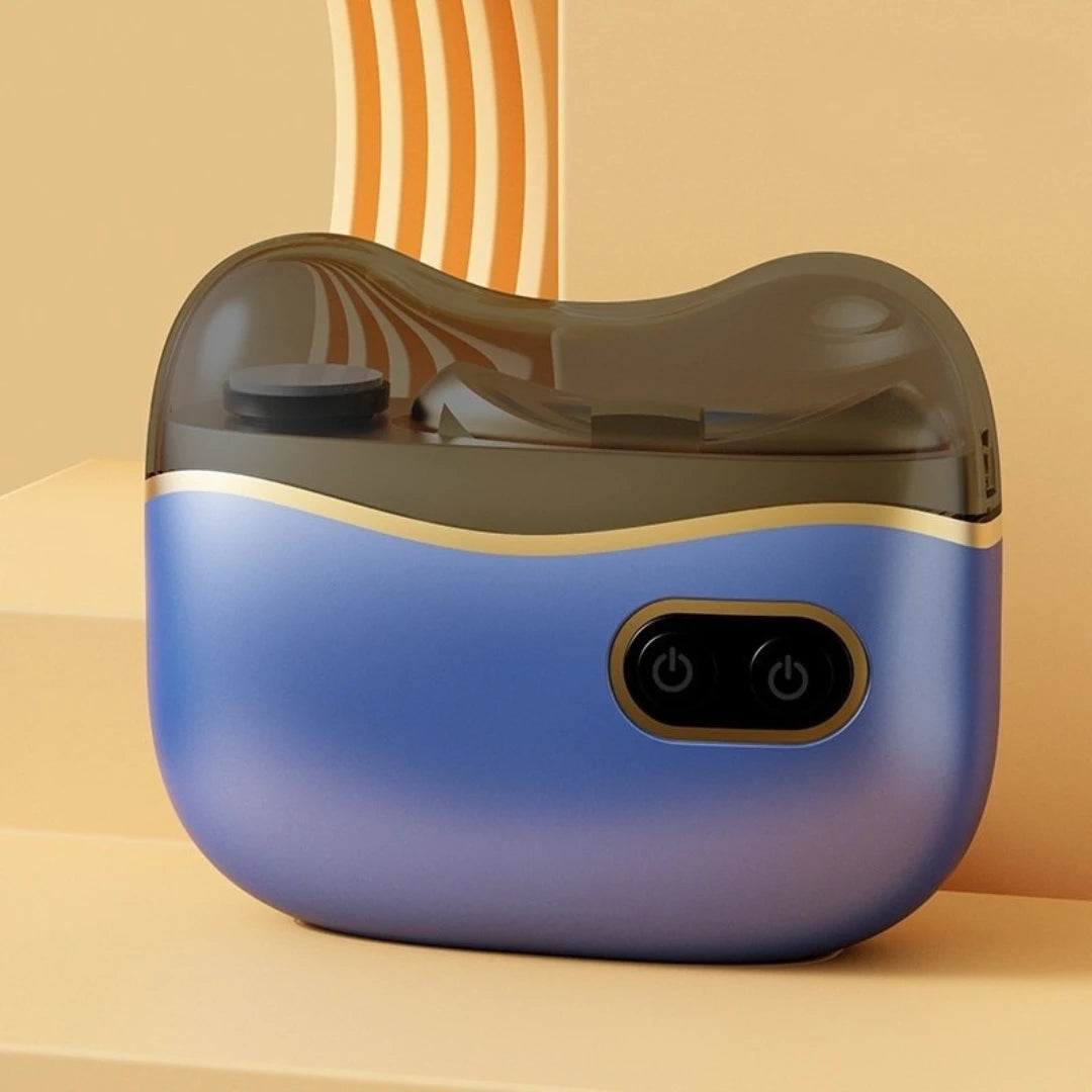 Josh & Tate - NailPod™ Automatic Nail Care System - Blue and black electronic device on a beige surface with a striped curtain in the background