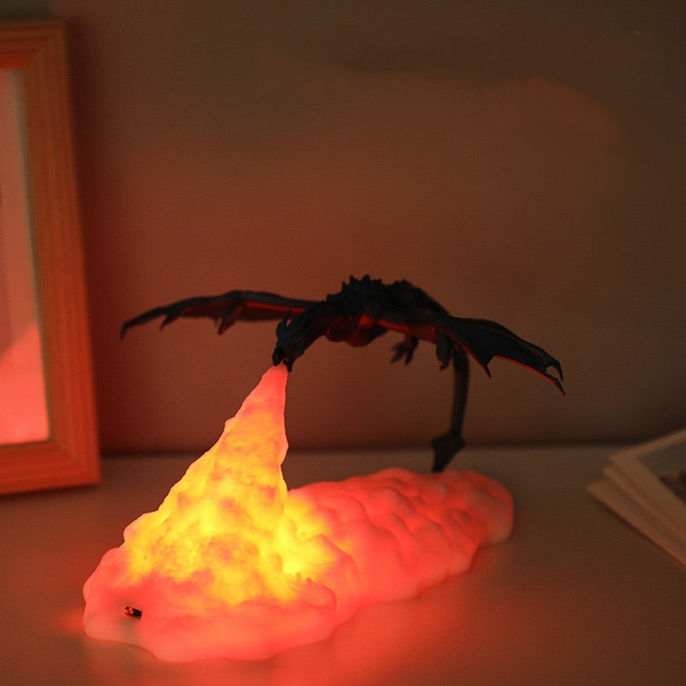 Dragon-shaped lamp with glowing red base on a wooden surface