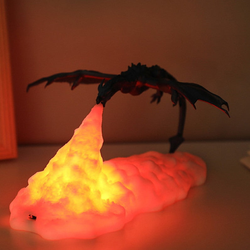 Dragon figurine with glowing red and yellow flames on a plain background