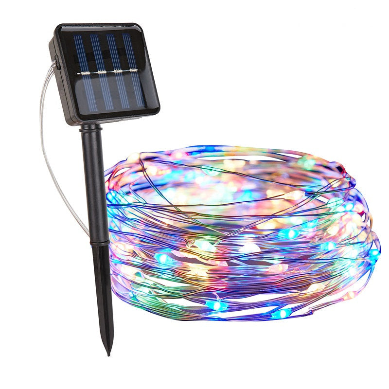 Solar-powered LED string light with colorful bulbs on a white background