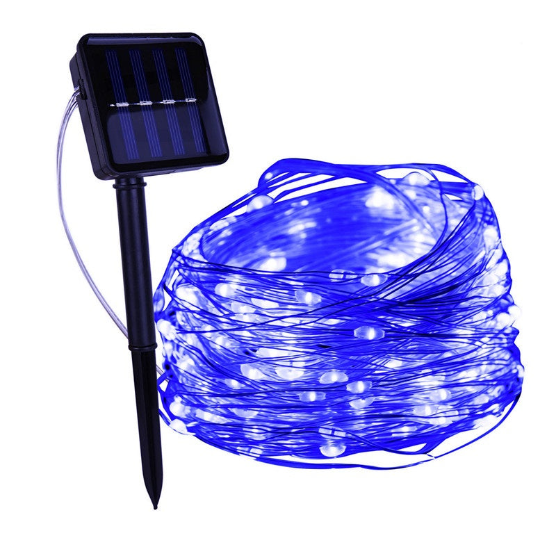 Blue string lights with solar panel and stake on a white background