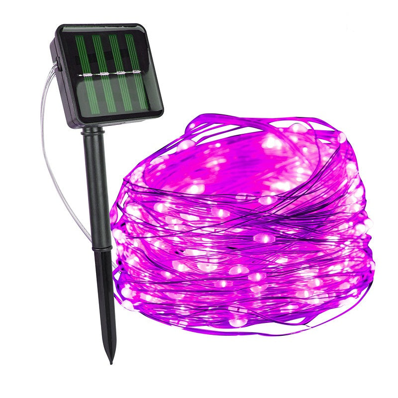 Purple string lights with solar panel and stake on a white background