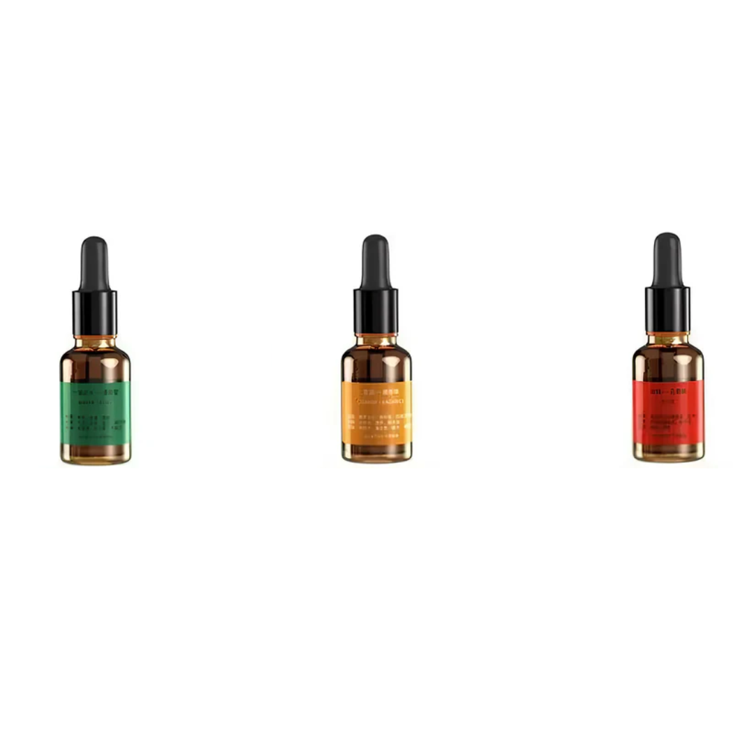 Three dropper bottles with different colored labels on a white background