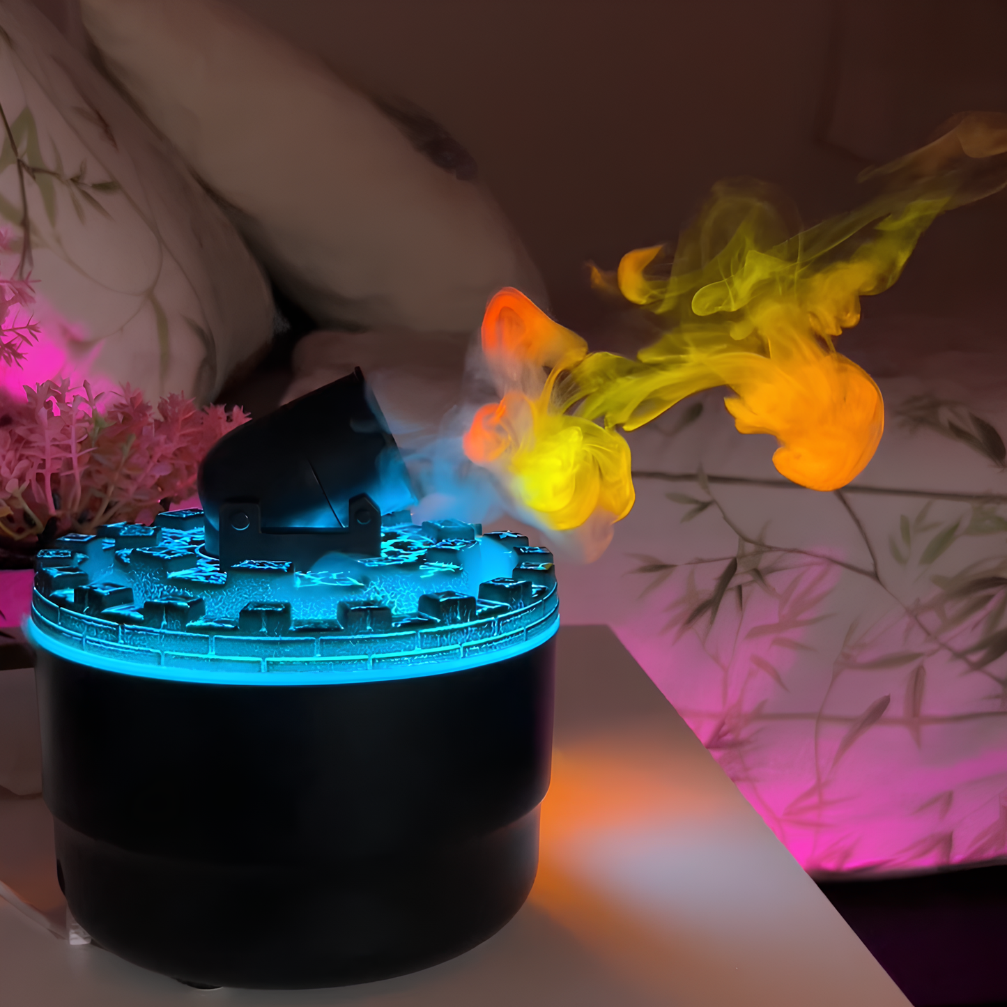 Black device emitting colorful smoke with a blurred background
