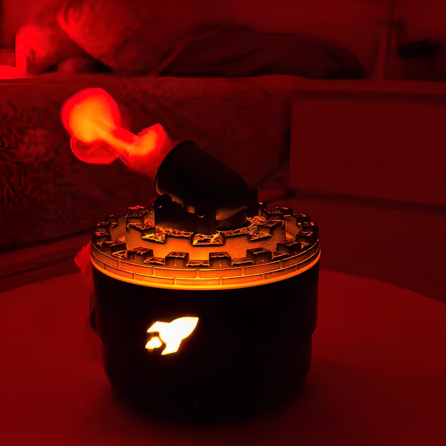 Black lantern with flame-like design on a red background