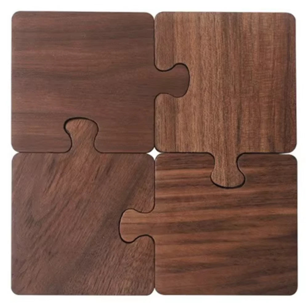 Four wooden puzzle pieces arranged in a square formation on a white background.