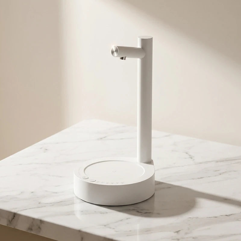 Josh & Tate - TapFlow™ Desktop Water Dispenser - White electronic device on a marble surface with a neutral background