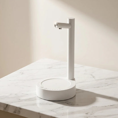 Josh & Tate - TapFlow™ Desktop Water Dispenser - White electronic device on a marble surface with a neutral background