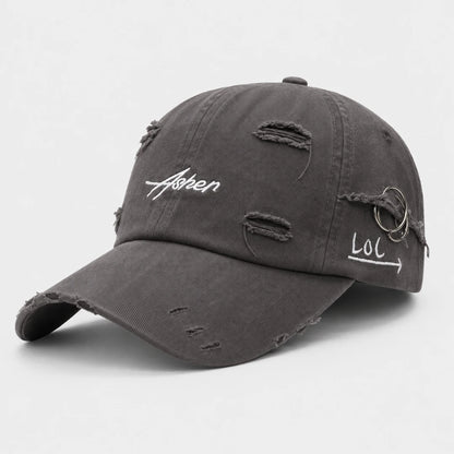 Josh & Tate - AsherLOL™ Distressed Cap - Gray baseball cap with a logo on a white background