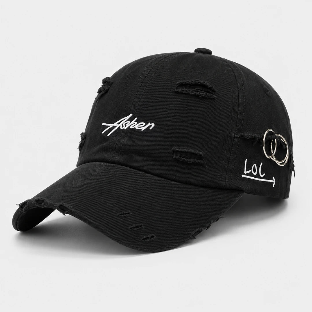 Josh & Tate A black distressed baseball cap with white embroidered text reading 'Asben' on the front and 'LOL' with a ring detail on the side, shown on a light gray background. AsherLOL™ Distressed Cap - 