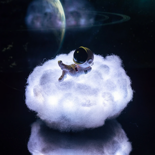 Illustration of an astronaut in a space suit standing on a fluffy cloud with planets in the background