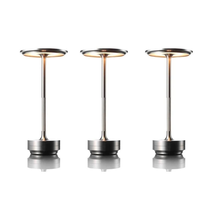 Three modern pendant lights on a white background