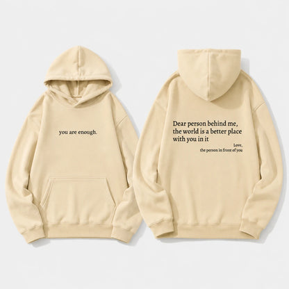 Josh & Tate - BehindMe™ Quote Hoodie - A light beige hoodie shown from both the front and back on a clean white background. The front features the text 'you are enough.