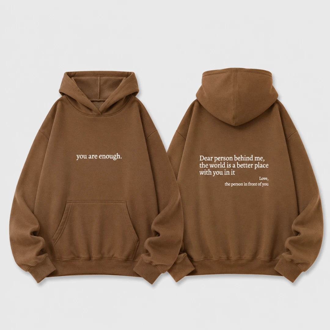 Josh & Tate - BehindMe™ Quote Hoodie - A brown pullover hoodie shown from both the front and back on a light gray background. The front features the phrase 'you are enough.