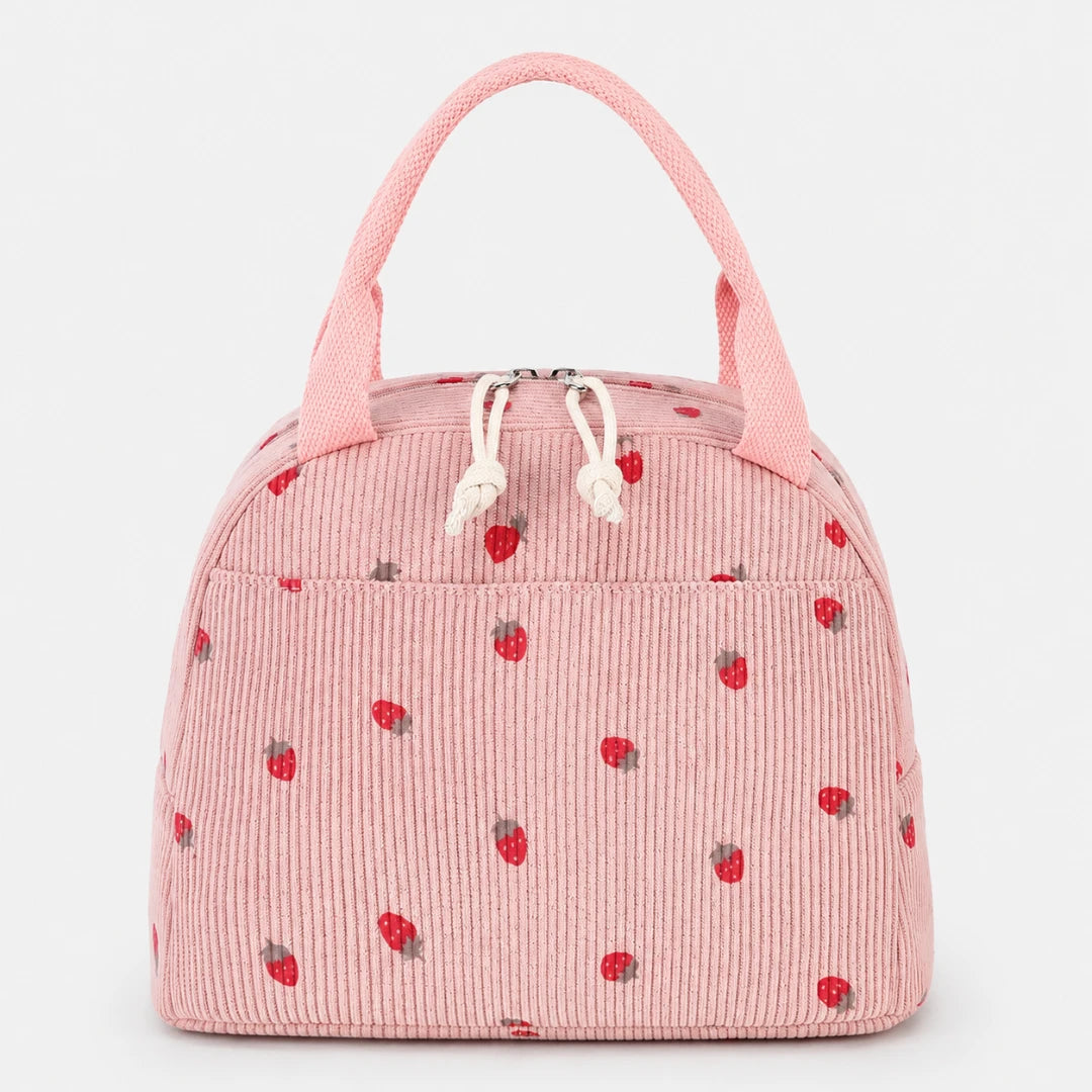 Josh & Tate - BerryTote™ Insulated Lunch Bag - A pink corduroy lunch bag with a strawberry pattern, featuring two top handles and white drawstrings, shown against a plain light gray background.