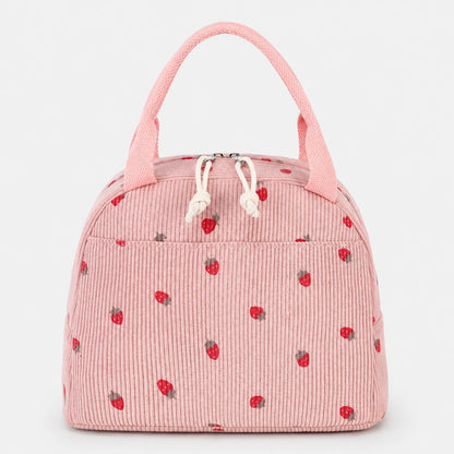 Josh & Tate - BerryTote™ Insulated Lunch Bag - A pink corduroy lunch bag with a strawberry pattern, featuring two top handles and white drawstrings, shown against a plain light gray background.