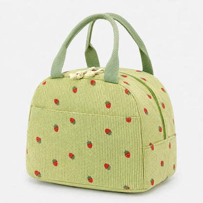 A light green corduroy lunch bag with a strawberry pattern, featuring two top handles and a front zippered pocket, shown on a plain white background.