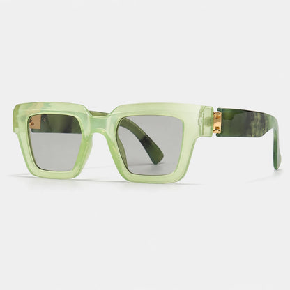 Josh & Tate - BlockFrame™ Bold Square Sunglasses - Square sunglasses with translucent light green frames, dark green marbled temples, and silver-gray lenses, shown on a light gray background.