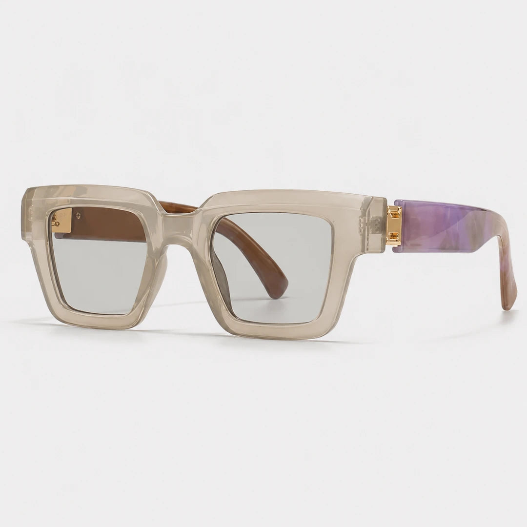 Josh & Tate - BlockFrame™ Bold Square Sunglasses - Square-frame sunglasses with translucent beige acetate frames, light gray lenses, brown inner temple tips, and purple acetate temple arms with gold-tone metal hardware, shown on a light gray background.